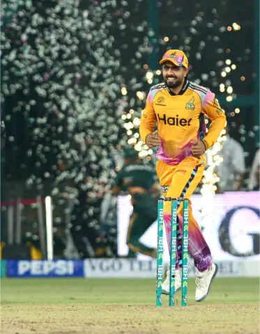  PESHAWAR Zalmi captain Babar Azam smiles after the win against Islamabad United in the Pakistan Super League Qualifier at the National Bank Stadium. &mdash;Tahir Jamal/White Star 