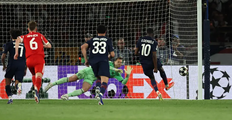  PSG&rsquo;S Ousmane Dembele scores from the penalty spot past Bayern Munich goalkeeper Manuel Neuer during their Champions League semi-final first leg at the Parc des Princes Stadium.&mdash;AFP 