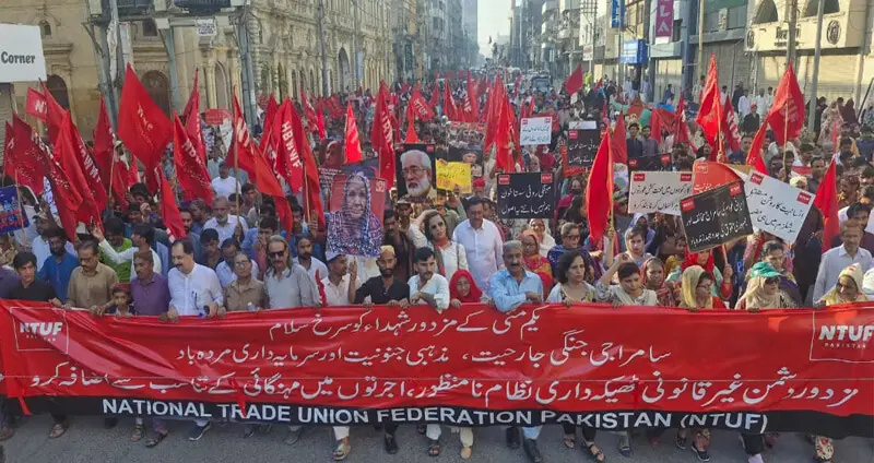 A large number of people, including workers and rights activists, participate in the main May Day rally. &mdash;Dawn  
