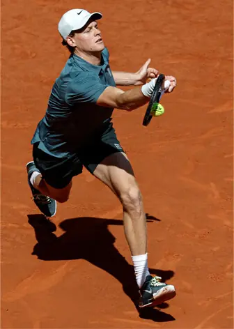  ITALY&rsquo;S Jannik Sinner returns a shot to Arthur Fils of France during their Madrid Open semi-final at the Caja Magica on Friday.&mdash;AFP 