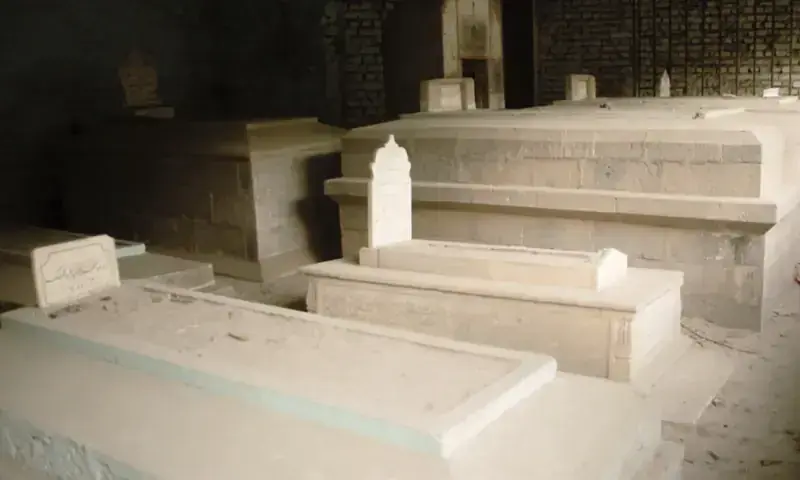 The enclosed graveyard within Shahzada Mosque, where Syed Abdul Malik Tura lies buried alongside members of his family.