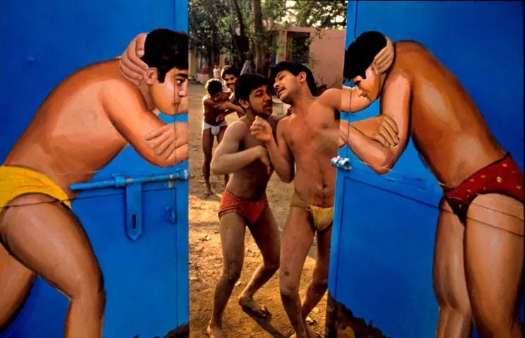   Through the doors of a wrestling school in Delhi, circa 1989 | Raghu Rai/Magnum Photos  