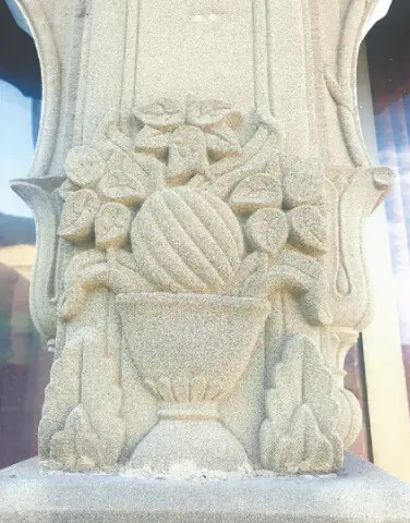 Figures sculpted on the sandy stone pillars and arches.