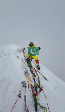  SAJID Sadpara holds the national flag upon reaching the top of Mount Makalu in Nepal.&mdash;Dawn   