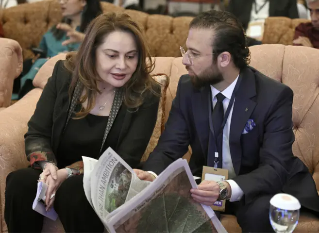  English Biscuit Manufacturers CEO Dr Zeelaf Munir in conversation with an attendee at the conference. &mdash; White Star 