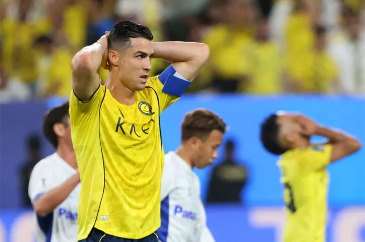 RIYADH: Al Nassr’s Cristiano Ronaldo reacts during the AFC Champions League Two final against Gamba Osaka at the Al-Awwal Park Stadium.—AFP