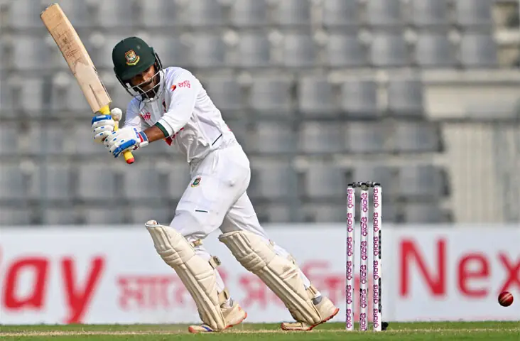  SYLHET: Bangladesh batter Mahmudul Hasan watches the ball after playing a shot during the second Test against Pakistan at the Sylhet International Cricket Stadium on Sunday.&mdash;AFP 