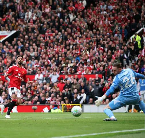MANCHESTER: Matheus Cunha (L) of Manchester United scores during the Premier League match against Nottingham Forest at Old Trafford on Sunday.—Reuters