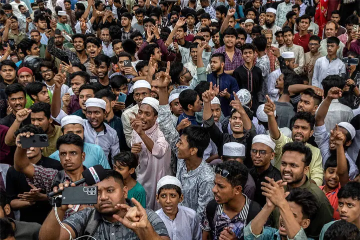 demonstrators shout slogans during a protest in Dhaka over alleged rape of a child.—AFP