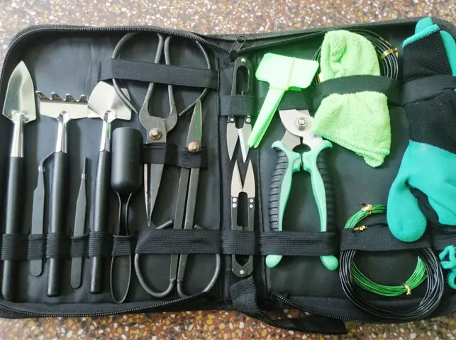 A multi-purpose gardening kit, which includes tools for bonsai