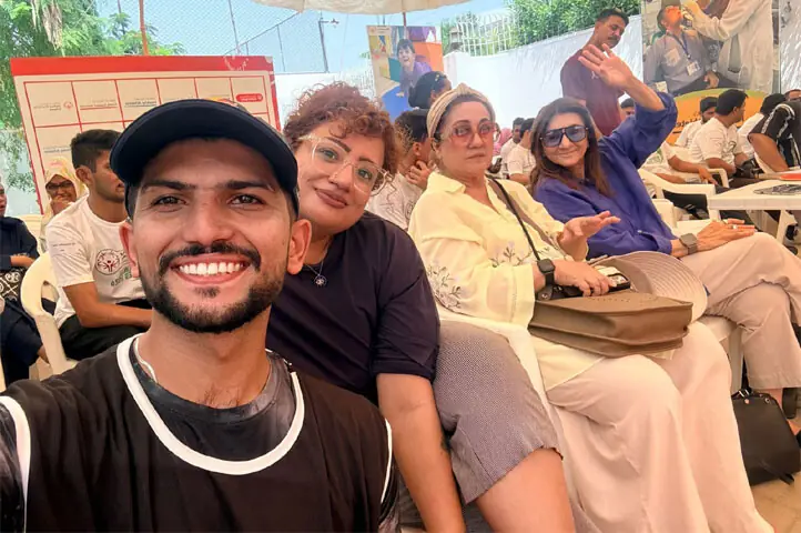 Muhammad Affan with the team of SOP at an event in Karachi