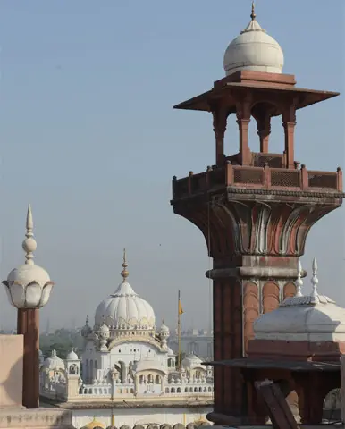 The Dera Sahib Gurdwara’s dome can be seen in juxtaposition with the minaret of the Badshahi Mosque in Lahore | Arif Ali/White Star