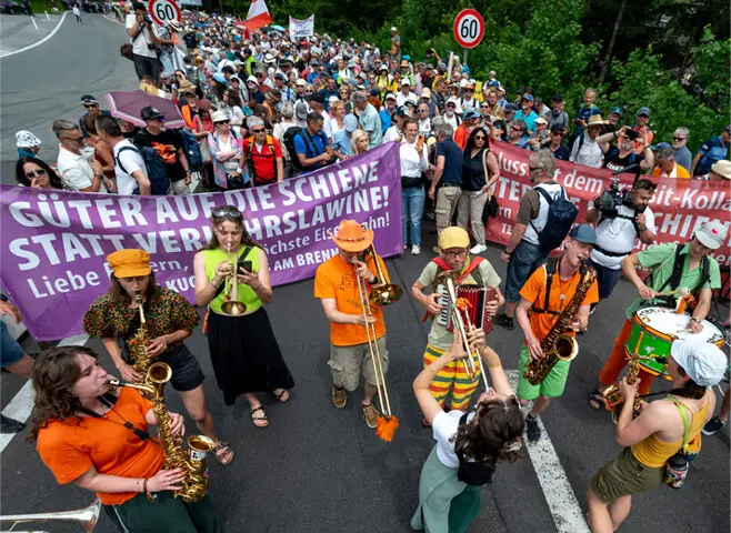AustrianS demonstrate during the blockade of a highway connecting Germany and Italy.—AFP