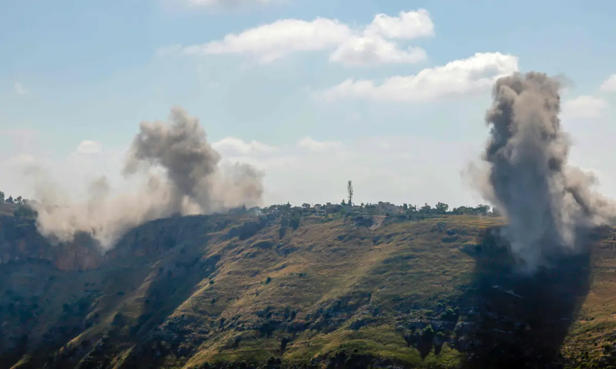 A photograph taken from the Marjayoun area in southern Lebanon shows smoke rising after an Israeli air strike on the village of Arnoun on May 30, 2026. — AFP