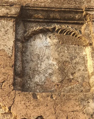 A fading fragment of fresco and decorative artwork highlights the urgent need for intervention by heritage and archaeology authorities.