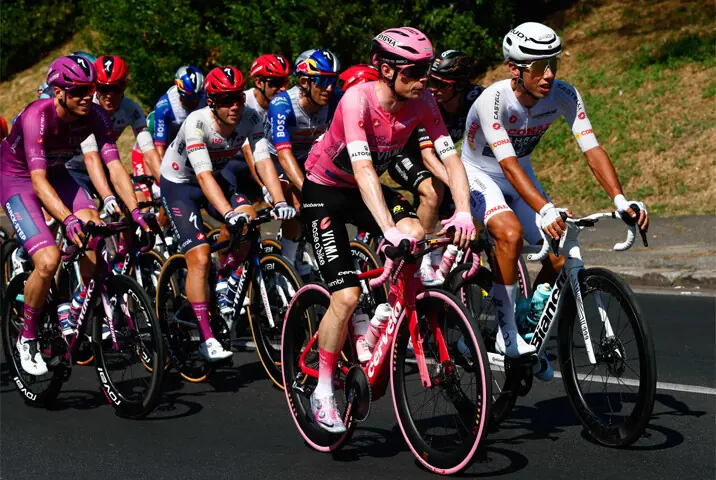TEAM Visma Lease a Bike’s Danish rider Jonas Vingegaard (L) wearing the overall leader’s pink jersey rides next to Bahrain-Victorious Afonso Eulalio of Portugal in the best young rider’s white jersey during the 21st stage of the Giro d’Italia on Sunday.—AFP
