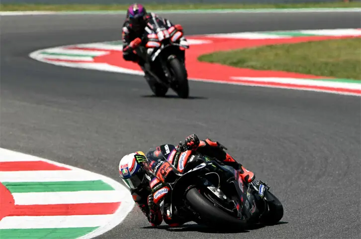 TEAM Aprilia Racing’s Italian rider Marco Bezzecchi steers his bike ahead of team-mate Jorge Martin of Spain during the Italian Moto GP Grand Prix at the Mugello circuit on Sunday.—AFP