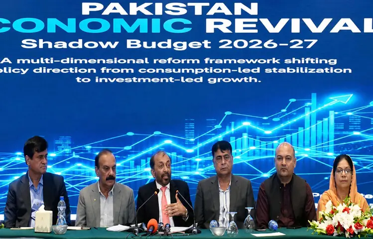  Dr Farooq Sattar speaks, alongside other leaders, at the press conference.&mdash;PPI 