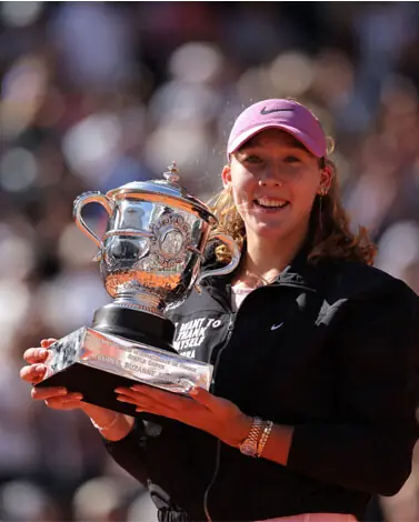 RUSSIA’S Mirra Andreeva poses with the French Open trophy after defeating Maja Chwalinska of Poland in the final at the Roland-Garros Complex on Saturday.—AFP
