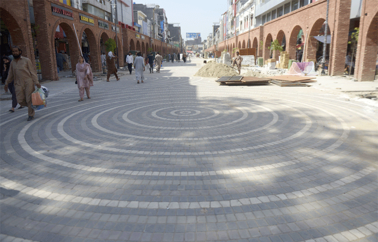  Tuff tiles have been fixed on the road for pedestrians to walk. 