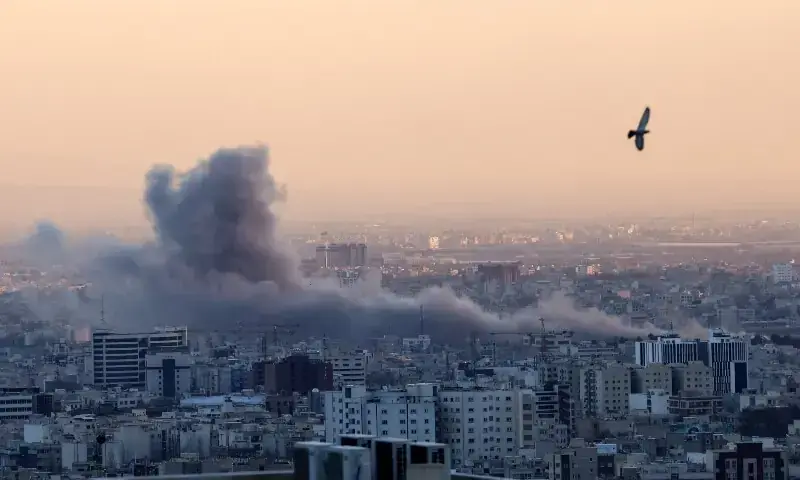 A plume of smoke rises after a strike on the Iranian capital Tehran, on March 3. — AFP/File