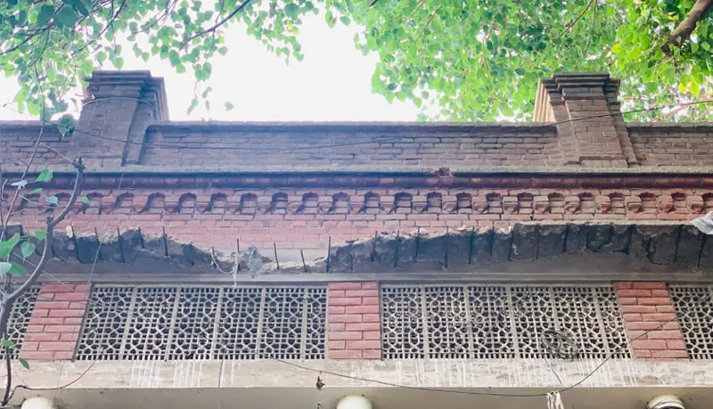 A May 2026 photo of the rear façade of the historic Zail Ghar, with exposed rebar showing that the structure needs renovation | Photo by the writer
