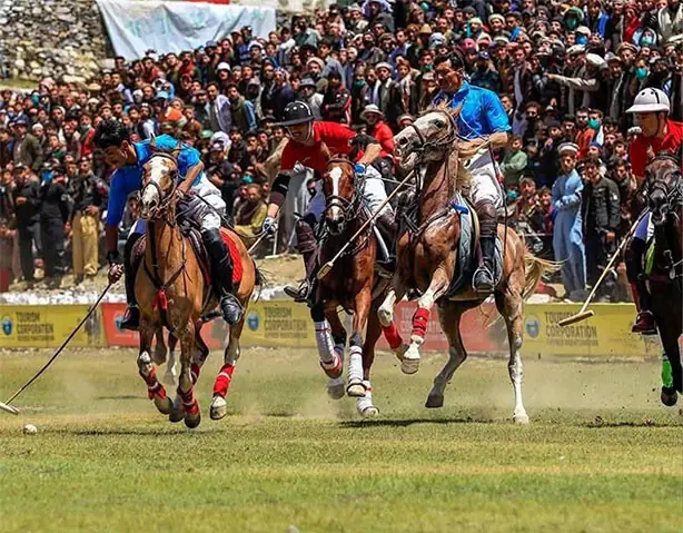 players from Gilgit-Baltistan and Chitral battle fiercely during the final match of Shandur Polo Festival 2026.—Dawn