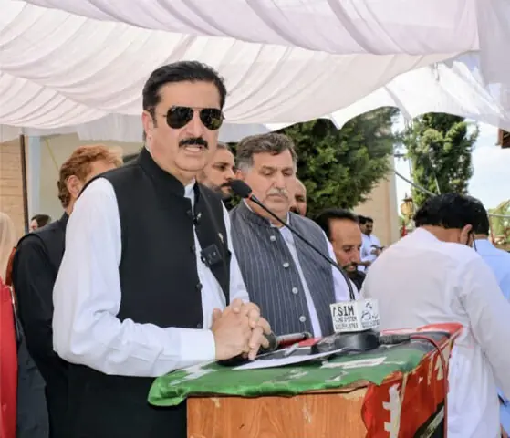 KP Governor Faisal Karim Kundi addresses a gathering in Mansehra on Sunday. — Dawn