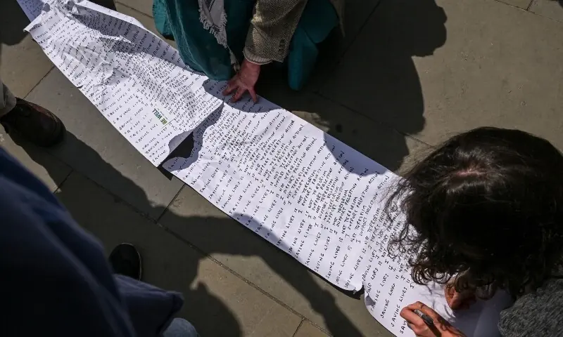 People attend a demonstration opposing the government’s decision to ban Palestine Action as a terror organisation, following a Court of Appeal ruling on the lawfulness of proscribing the pro-Palestinian group under terrorism laws, outside the Royal Courts of Justice, in London, Britain, June 15, 2026. —Reuters