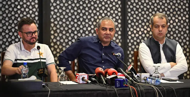 LAHORE: Pakistan Cricket Board chairman Mohsin Naqvi (C) addresses a press conference as Pakistan white-ball head coach Mike Hesson (L) and PCB chief operating officer Sumair Ahmed Syed look on at a local hotel on Monday.—M. Arif/White Star