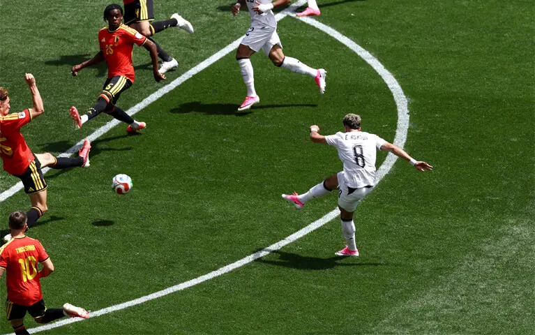 SEATTLE (Washington): Egypt’s Emam Ashour (R) shoots to score during the Group ‘G’ match against Belgium at the Seattle Stadium.—Reuters