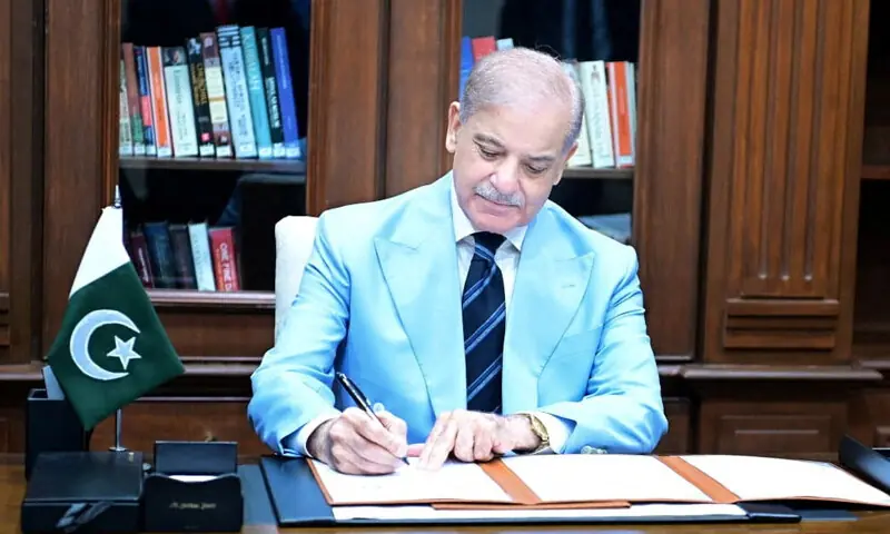 Prime Minister Shehbaz Sharif signs the Islamabad Memorandum of Understanding as mediator.—AFP/Reuters