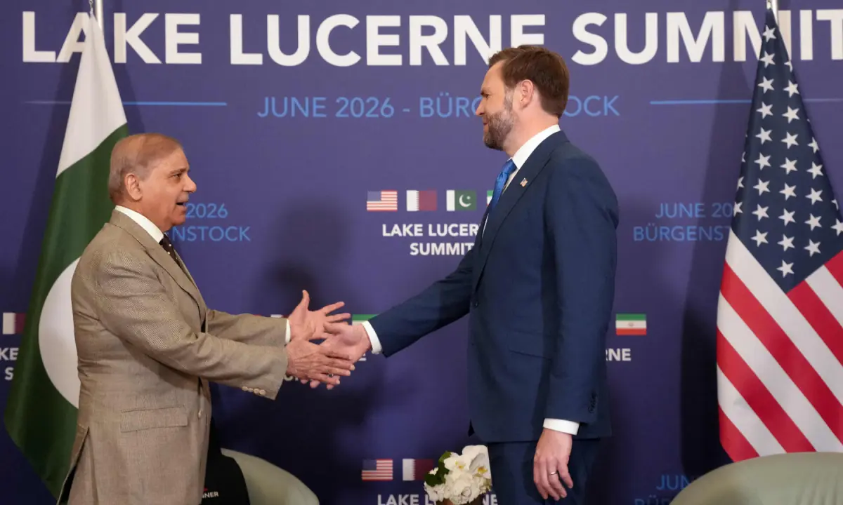 US Vice President JD Vance (R) shakes hands with Pakistan’s Prime Minister Shehbaz Sharif at the Burgenstock luxury hotel complex overlooking Lake Lucerne, Switzerland, on June 21, 2026. ─ AFP