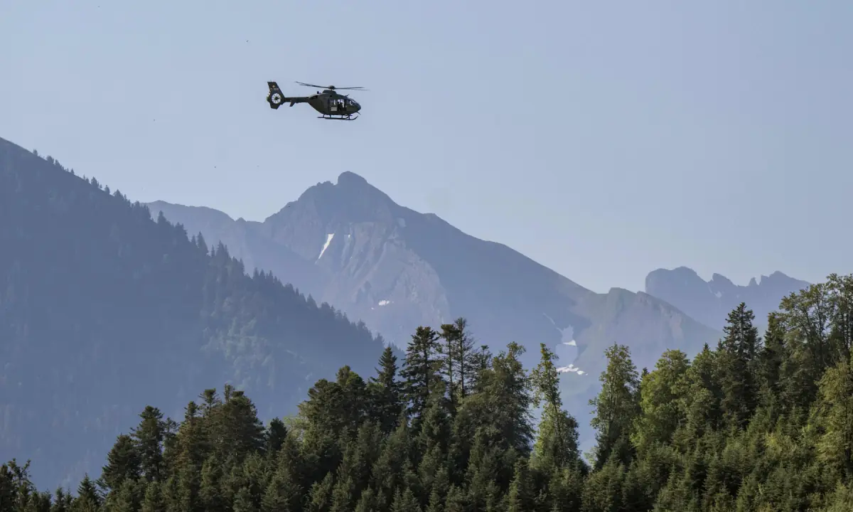 A Swiss Army Helicopter flies all around the Buergenstock resort in Obbuergen, near Lucerne, Switzerland, Sunday, June 21, 2026. ─ Reuters