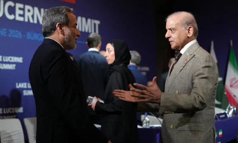 Iran&rsquo;s Foreign Minister Abbas Araqchi and Prime Minister Shehbaz Sharif greet each other before the start of a quadrilateral meeting between the U.S., Iran, Pakistan, and Qatar at the Lake Lucerne Summit, aimed at advancing a deal to end the Middle East conflict, at Buergenstock Resort Lake Lucerne, near Stansstad, Switzerland, June 21, 2026. &mdash; Reuters