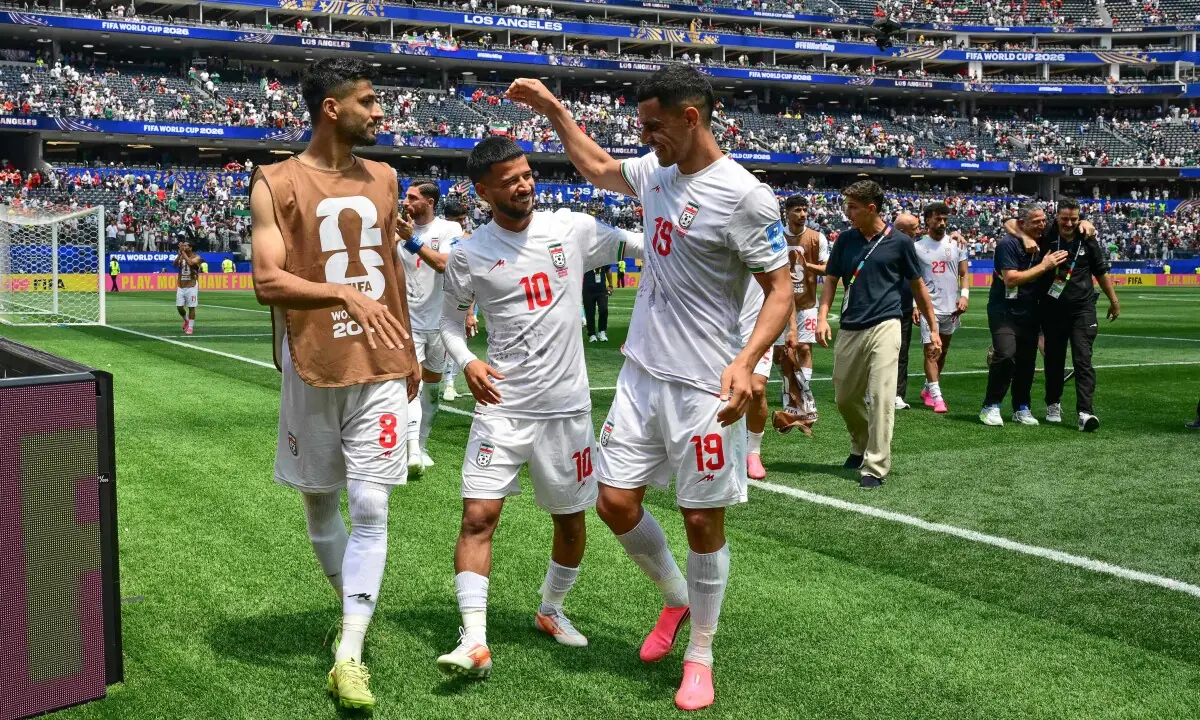  Iran&rsquo;s  midfielder #08 Mohammad Mohebbi, Iran&rsquo;s midfielder #10 Mehdi Ghayedi and Iran&rsquo;s defender #19 Ali Nemati celebrate at the end of the 2026 World Cup Group G football match between Belgium and Iran at the Los Angeles Stadium in Inglewood on June 21, 2026. &mdash; AFP 