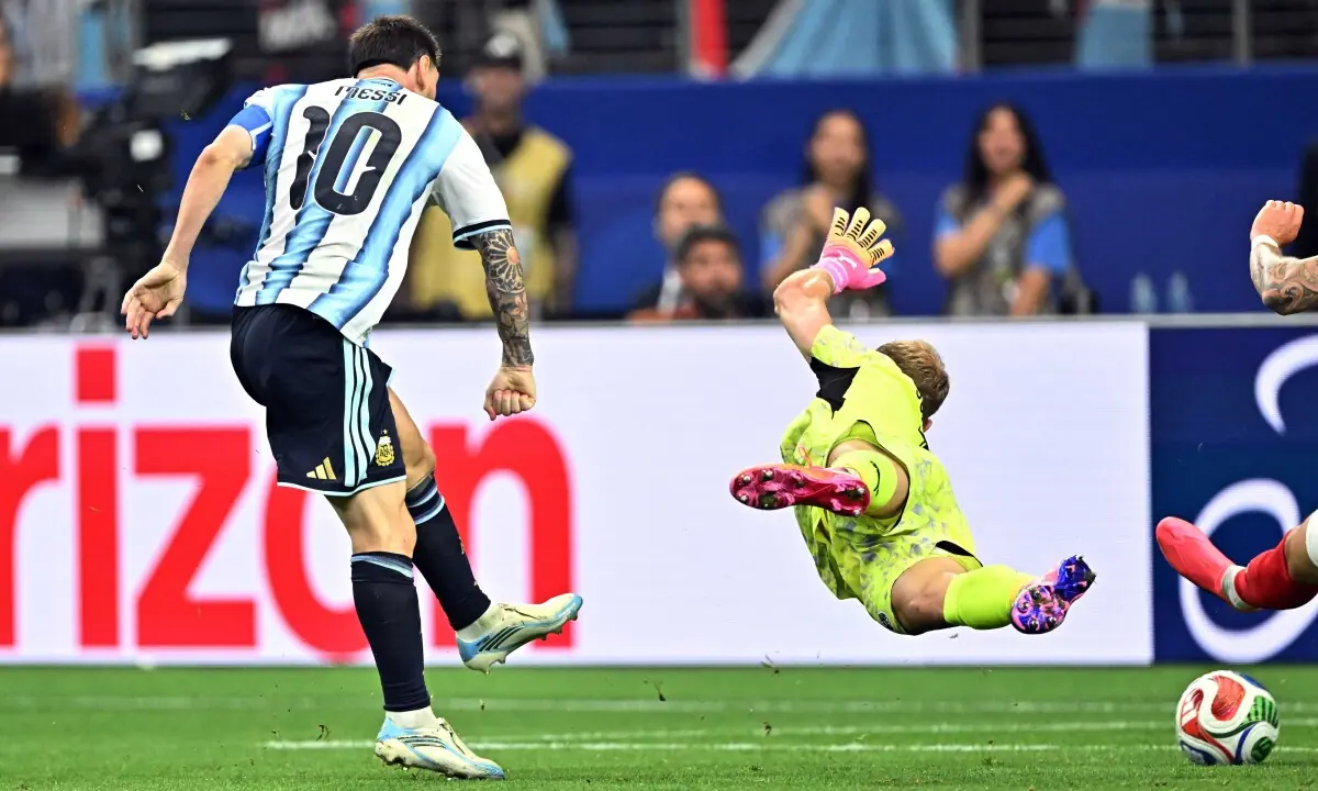Magic Messi makes World Cup history to send Argentina into last 32