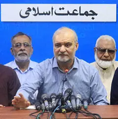 Jamaat chief Hafiz Naeemur Rehman speaks at the press confernce.—Dawn
