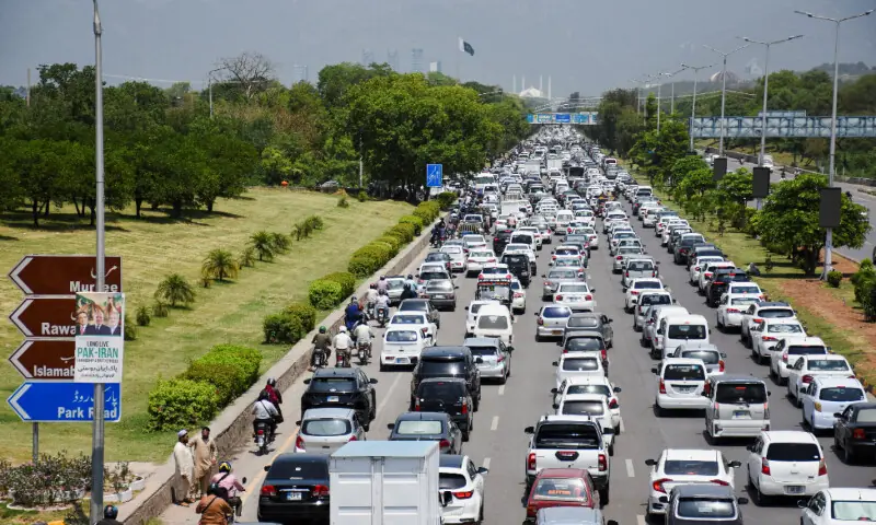  Vehicles are stuck in traffic following security checks ahead of the arrival of Iran&rsquo;s President Masoud Pezeshkian in Islamabad, Pakistan, June 23. &mdash; Reuters 