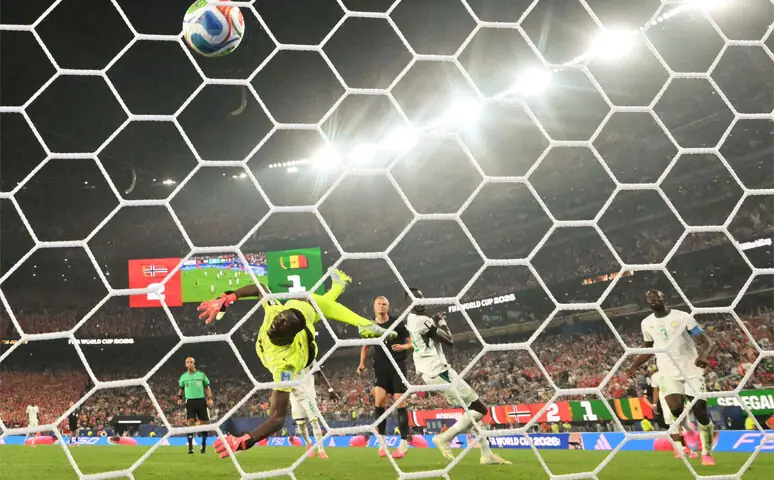 Norway’s Erling Haaland (C) scores past Senegal goalkeeper Edouard Mendy during their Group ‘I’ match at the New York/New Jersey Stadium.—AFP