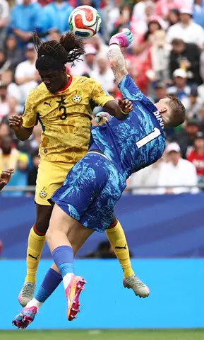   BOSTON (Massachusetts): Ghana&rsquo;s Caleb Yirenkyi (L) fights for the ball with England goalkeeper Jordan Pickford during their Group &lsquo;L&rsquo;  match at the Boston Stadium.&mdash;AFP 