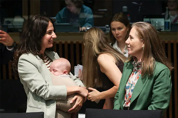 Swedish minister breaks ground by bringing baby to EU talks