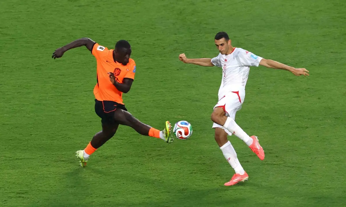 Netherlands&rsquo; Brian Brobbey in action with Tunisia&rsquo;s Ellyes Skhiri during the FIFA World Cup 2026 Group F match between Tunisia and Netherlands at Kansas City Stadium on June 25, 2026 in Kansas City, Missouri. &mdash; Reuters