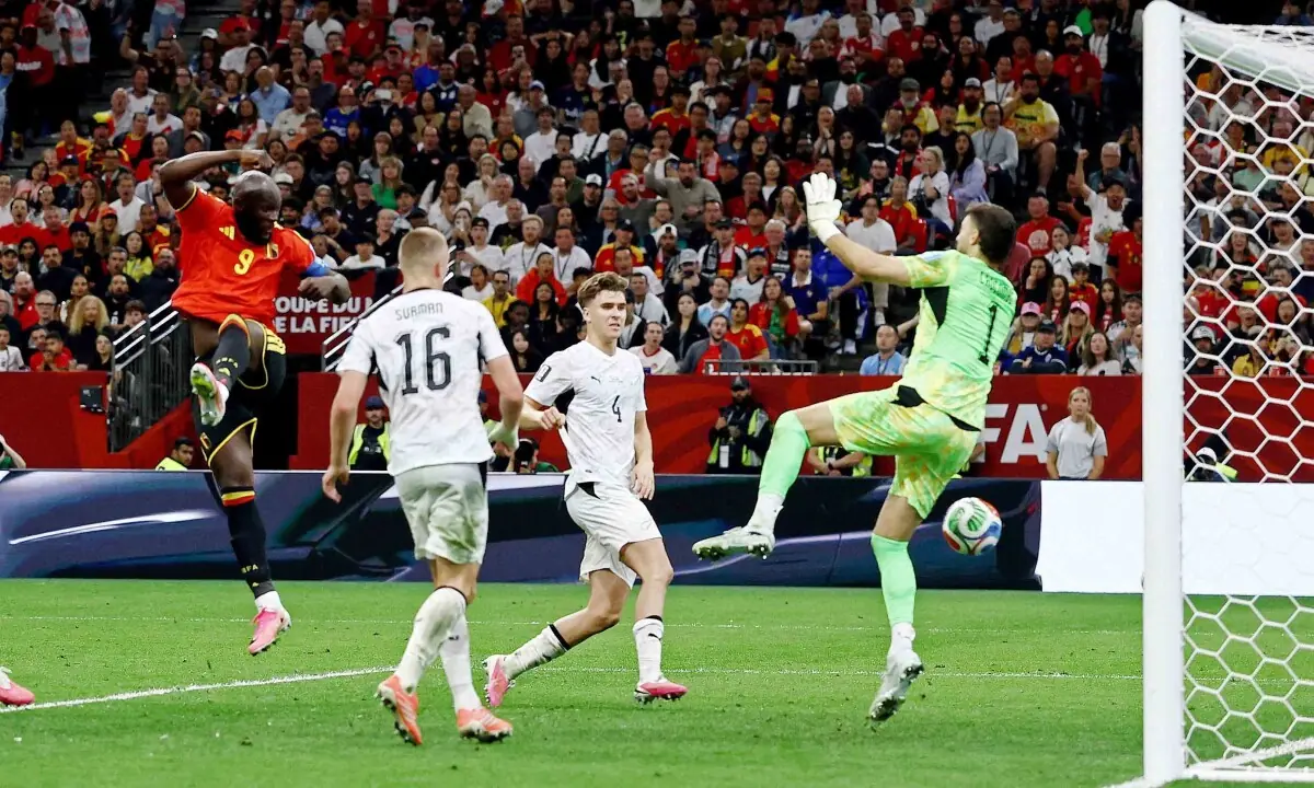 Belgium into FIFA World Cup last 32 with New Zealand rout