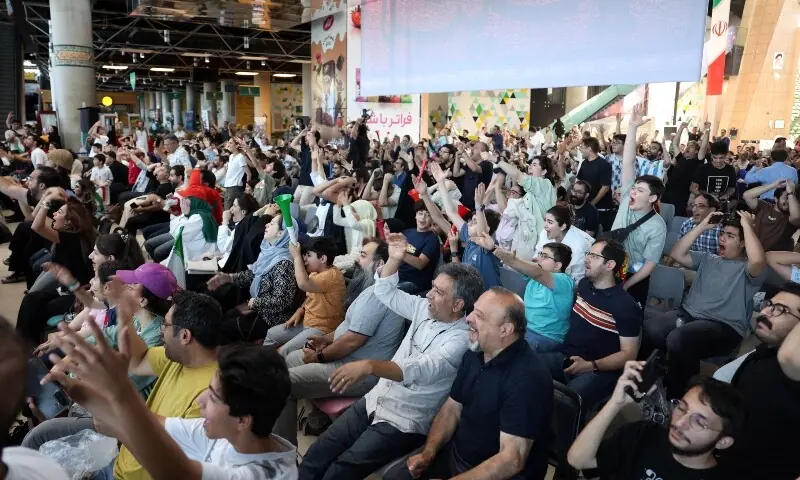 Iranians react as they watch the FIFA World Cup 2026 Group G football match between Egypt and Iran in Tehran on June 27, 2026. &mdash;AFP