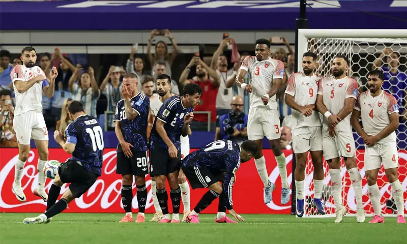  ARLINGTON (Texas): Argentina&rsquo;s Lionel Messi (second L) shoots to score from a free-kick during the Group &lsquo;J&rsquo; match against Jordan at the Dallas Stadium.&mdash;AFP 
