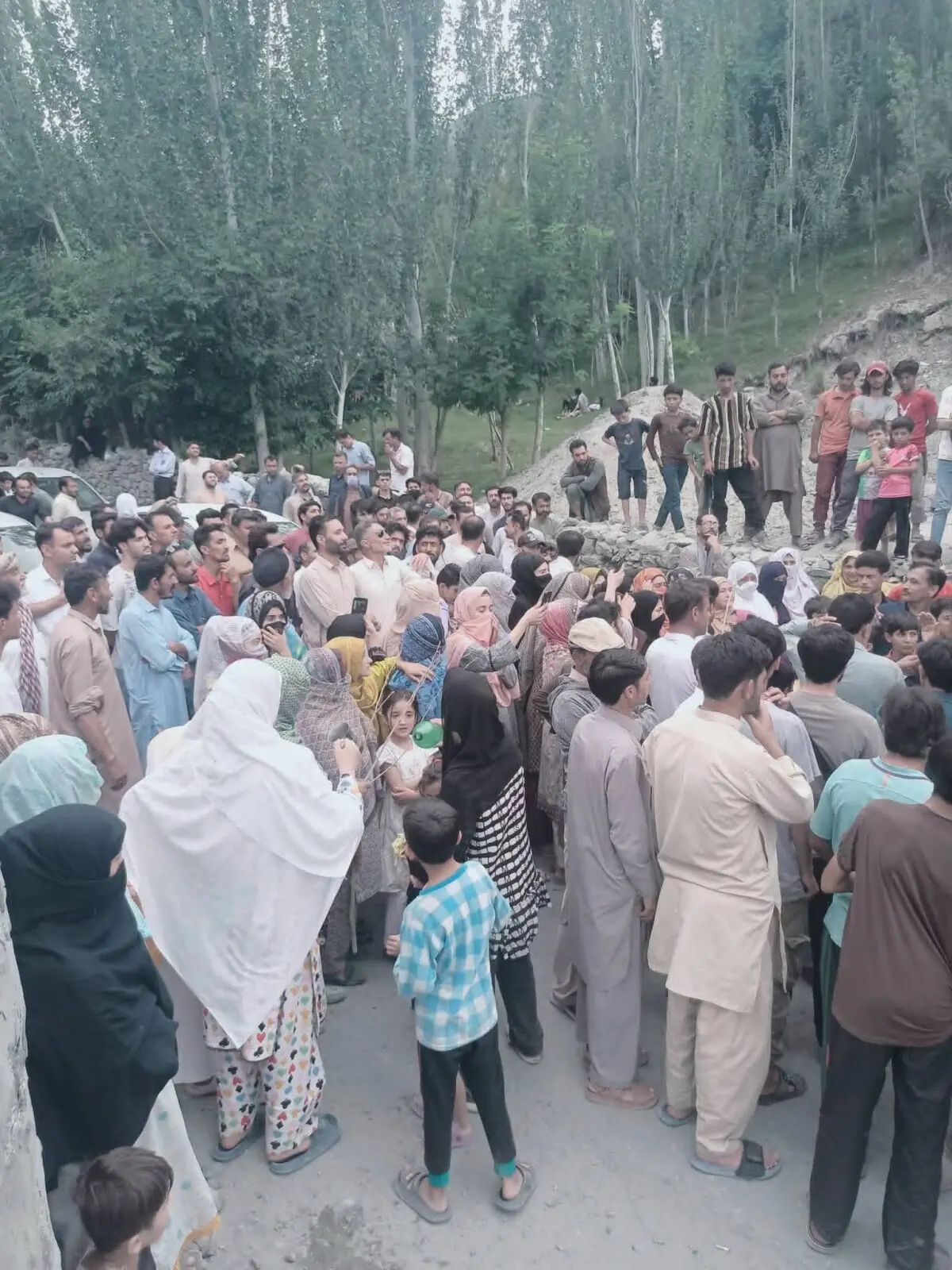    Citizens protest in Oshikhandass area in Gilgit against loadshedding. &mdash; Photo by author   