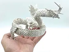 Ryujin 3.5 — a full dragon with claws, wings and a curling tail