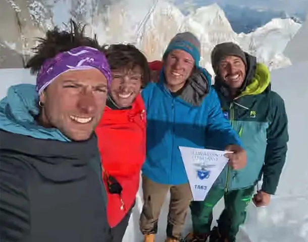 Matteo Della Bordella, Mirco Grasso, Luca Ducoli and Giacomo Mauri at the K7 base camp.—Dawn