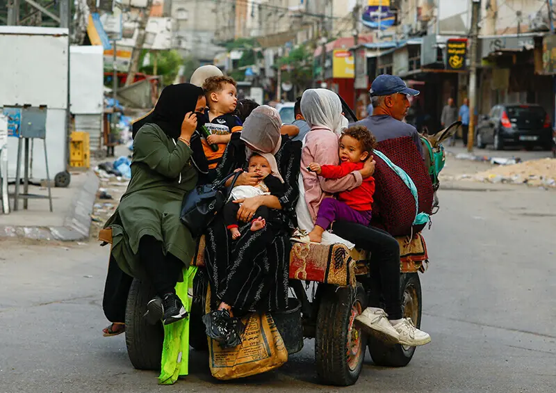 Palestinians flee their homes, amid Israeli strikes, in Khan Younis, southern Gaza Strip on October 10, 2023. —Reuters/File